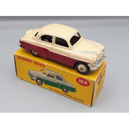 1080 - A boxed Dinky Toys No.164 maroon and cream Vauxhall Cresta Saloon, Nr M-M, box E