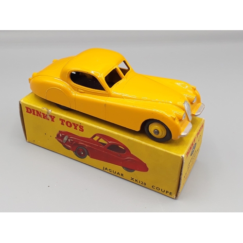 1082 - A boxed Dinky Toys No.157 yellow Jaguar XK120, Nr M-M, box VG-E