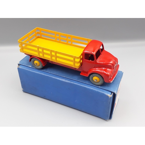 1091 - A boxed Dinky Supertoys No.531 red and yellow Leyland Comet Lorry, Nr M-M, box E