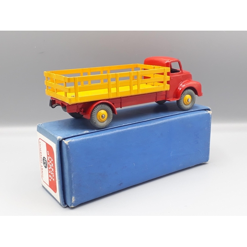 1091 - A boxed Dinky Supertoys No.531 red and yellow Leyland Comet Lorry, Nr M-M, box E