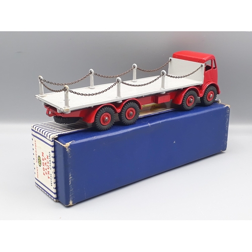 1113 - A boxed Dinky Supertoys No.905 red and grey Foden Flat Truck with chains, Nr M-M, box superb