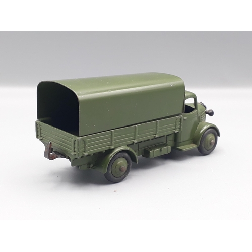 1123 - An unboxed Dinky Toys 30sm Austin Covered Truck U.S. Export, Nr M-M