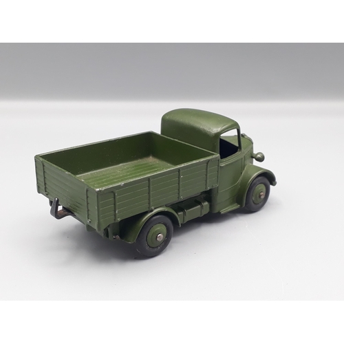 1124 - An unboxed Dinky Toys 25wm military Bedford Truck U.S. Export, Nr M-M