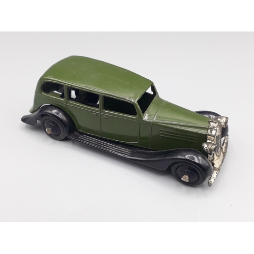 1128 - An unboxed Dinky Toys No.30d olive green Vauxhall, Nr M-M