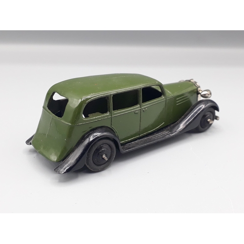 1128 - An unboxed Dinky Toys No.30d olive green Vauxhall, Nr M-M