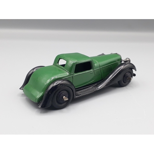 1129 - An unboxed Dinky Toys 36b dark green Bentley, Nr M-M