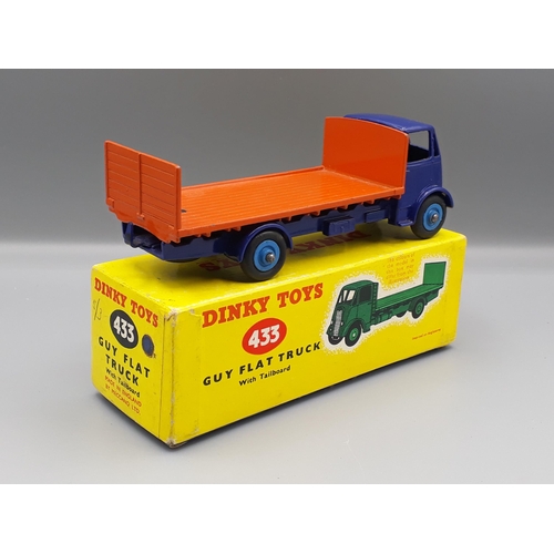 1140 - A boxed Dinky Toys No.433 violet blue and orange Guy Flat Truck, Nr M-M, box E