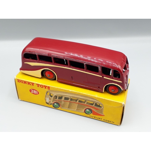 1153 - A boxed Dinky Toys No.281 maroon Luxury Coach, Nr M-M, box E+