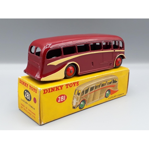 1153 - A boxed Dinky Toys No.281 maroon Luxury Coach, Nr M-M, box E+