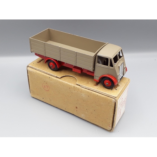 1160 - A boxed Dinky Supertoys No.511 Guy 4-ton Lorry with grey back and red chassis, Nr M-M, box superb