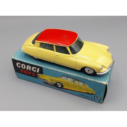 1165 - A boxed Corgi Toys No.210 yellow with red roofed Citroen DS19, Nr M-M, box E