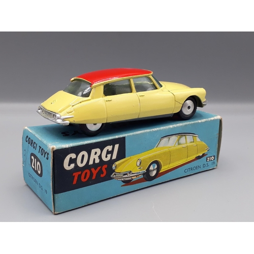 1165 - A boxed Corgi Toys No.210 yellow with red roofed Citroen DS19, Nr M-M, box E