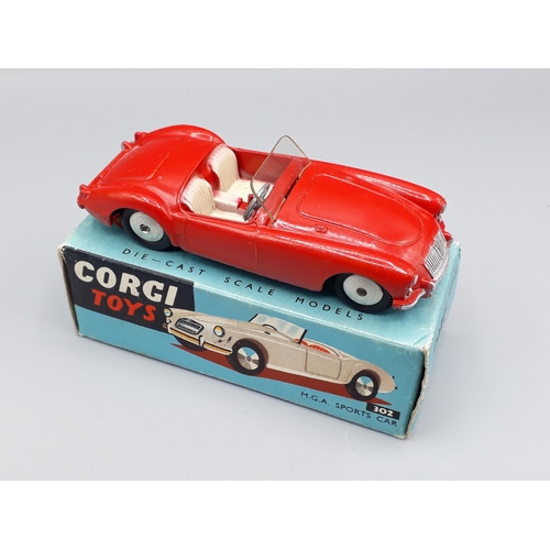 1170 - A boxed Corgi Toys No.302 red M.G.A. Sports Car, Nr M-M, superb box