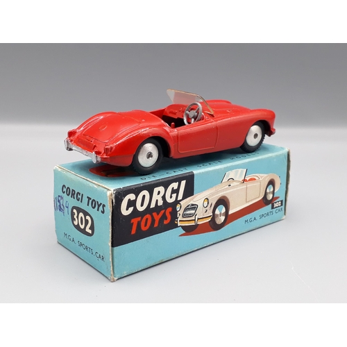 1170 - A boxed Corgi Toys No.302 red M.G.A. Sports Car, Nr M-M, superb box