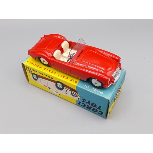 1171 - A boxed Corgi Toys No.302 red M.G.A. Sports Car in yellow and blue box, Nr M-M, box superb