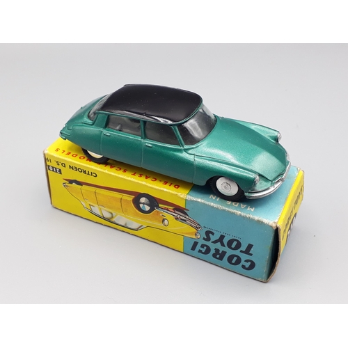 1187 - A boxed Corgi Toys No.210 metallic green and back Citroen D.S.19, Nr M-M, box VG-E