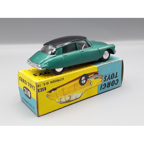 1187 - A boxed Corgi Toys No.210 metallic green and back Citroen D.S.19, Nr M-M, box VG-E