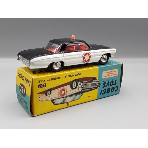 1204 - A boxed Corgi Toys No.237 Oldsmobile Sheriff Car, Nr M-M, box VG-E