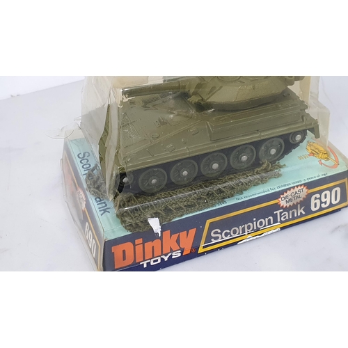 1226 - A Dinky Toys No.654 155mm Mobile Gun in perspex packaging and a Dinky Toys No.690 Scorpion Tank in p... 