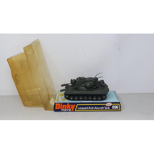 1227 - A Dinky Toys No.694 Tank Destroyer in perspex packaging and a No.696 Leopard Anti-Aircraft Tank in p... 