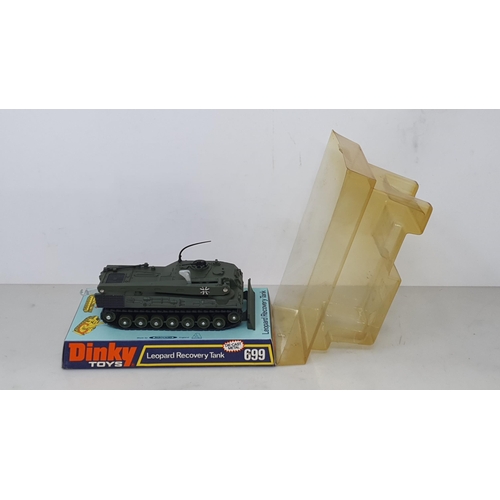 1228 - A Dinky Toys No.656 88mm Gun, No.692 Leopard Tank and No.699Leopard Recovery Tank, all in perspex pa... 