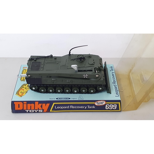 1228 - A Dinky Toys No.656 88mm Gun, No.692 Leopard Tank and No.699Leopard Recovery Tank, all in perspex pa... 