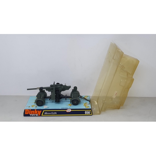 1228 - A Dinky Toys No.656 88mm Gun, No.692 Leopard Tank and No.699Leopard Recovery Tank, all in perspex pa... 