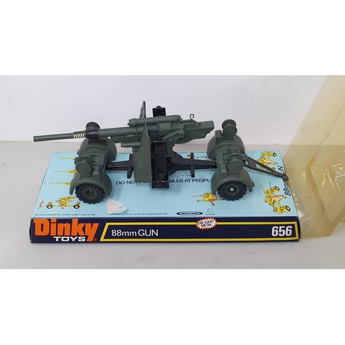 1228 - A Dinky Toys No.656 88mm Gun, No.692 Leopard Tank and No.699Leopard Recovery Tank, all in perspex pa... 