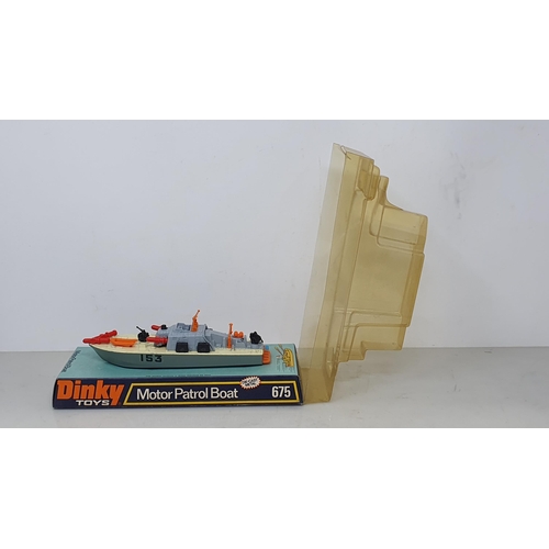 1230 - A Dinky Toys 675 Motor Patrol Boat and a N.721JU87B Stuka both in perspex packaging