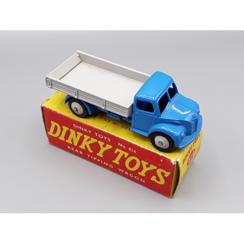 1243 - A boxed Dinky Toys No.414 blue rear tipping Wagon