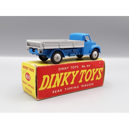 1243 - A boxed Dinky Toys No.414 blue rear tipping Wagon