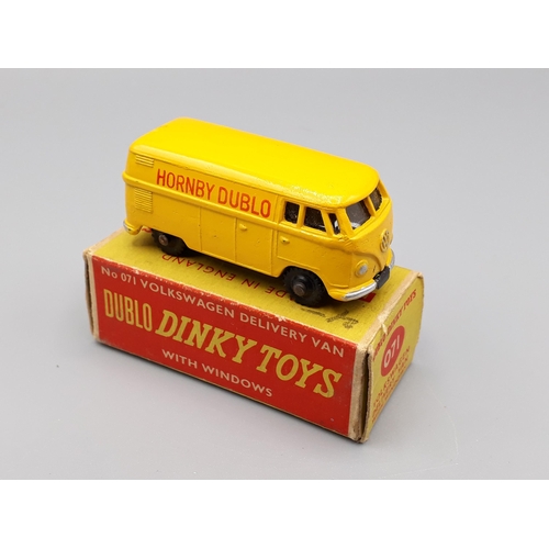 1248 - A boxed Dublo Dinky Toys No.071 Volkswagen Delivery Van