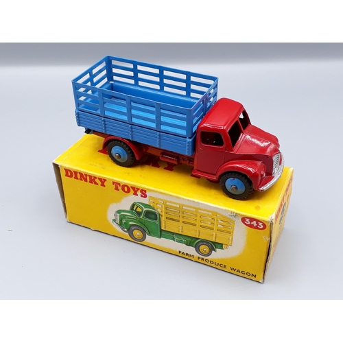 1257 - A boxed Dinky Toys No.343 red and blue Farm Produce Wagon