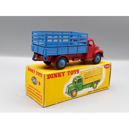 1257 - A boxed Dinky Toys No.343 red and blue Farm Produce Wagon