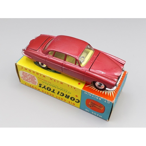 1263 - A boxed Corgi Toys No.238 red Jaguar Mark X