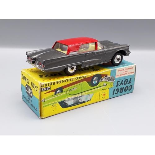 1268 - A boxed Corgi Toys No.214s dark grey and red Ford Thunderbird (biro marks on box)