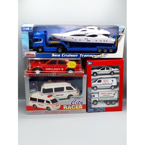 1286 - A box of boxed diecast Models including City Racer, Sea Cruiser Transporter, Ferrari Collection, etc... 