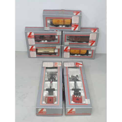 1292 - Nine boxed Lima H0 scale Coaches, eight boxed Wagons including Car Transporter and two boxed Signals