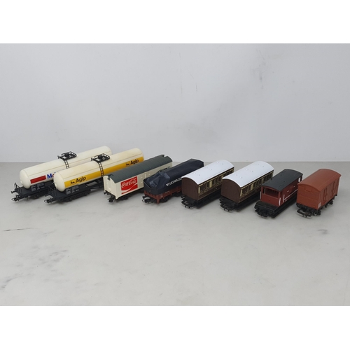 1294 - An unboxed Hornby 00 gauge D.M.U, an unboxed Bachmann 0-6-0T Pannier Tank, an LMS 0-4-0T saddle Tank... 