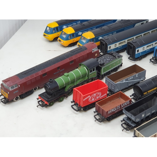 1297 - An unboxed Hornby 00 gauge B12 Class LNER Locomotive, an unboxed Hornby 'Western Courier' an Interci... 