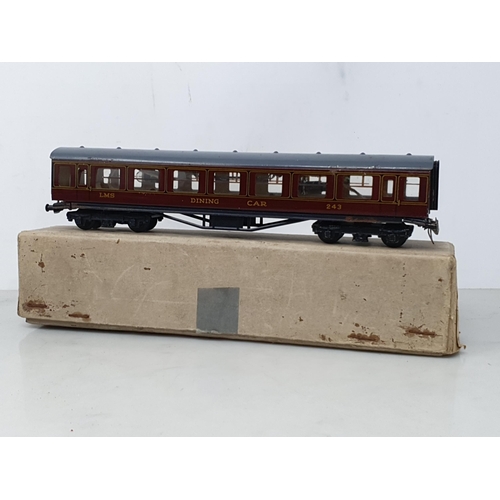 1298 - A boxed Trix Twin 2/587 LMS Dining Car, boxed 2/577 3rd/Van, boxed LMS 3rd Class Coach and a boxed D... 