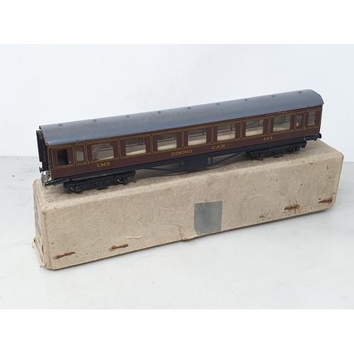 1298 - A boxed Trix Twin 2/587 LMS Dining Car, boxed 2/577 3rd/Van, boxed LMS 3rd Class Coach and a boxed D... 