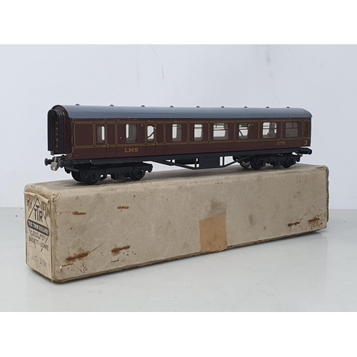 1298 - A boxed Trix Twin 2/587 LMS Dining Car, boxed 2/577 3rd/Van, boxed LMS 3rd Class Coach and a boxed D... 