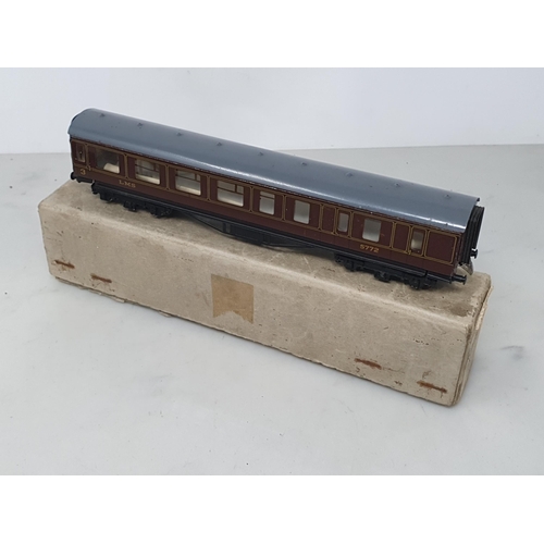 1298 - A boxed Trix Twin 2/587 LMS Dining Car, boxed 2/577 3rd/Van, boxed LMS 3rd Class Coach and a boxed D... 