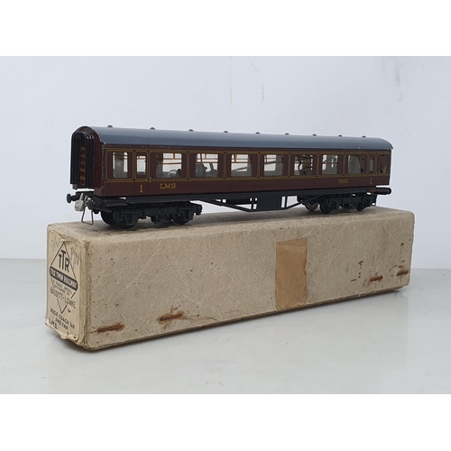 1298 - A boxed Trix Twin 2/587 LMS Dining Car, boxed 2/577 3rd/Van, boxed LMS 3rd Class Coach and a boxed D... 