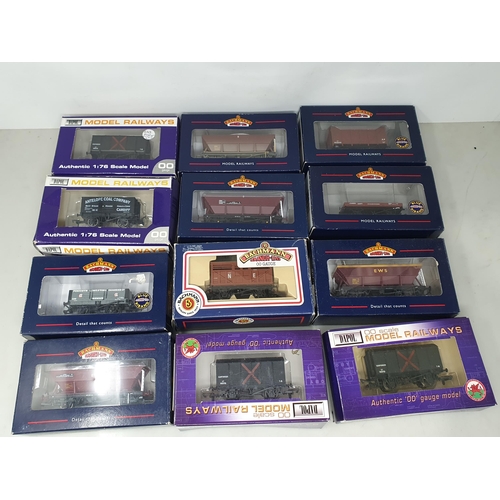 1306 - Thirty boxed Hornby, Bachmann and Dapol 00 gauge Wagons, a Hornby Rail Freight Set and a quantity of... 