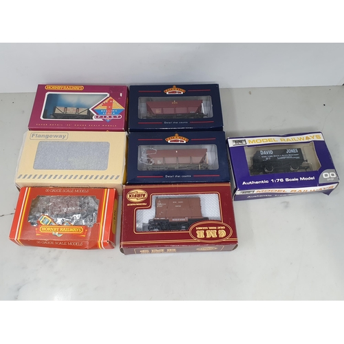 1306 - Thirty boxed Hornby, Bachmann and Dapol 00 gauge Wagons, a Hornby Rail Freight Set and a quantity of... 