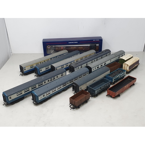 1306 - Thirty boxed Hornby, Bachmann and Dapol 00 gauge Wagons, a Hornby Rail Freight Set and a quantity of... 