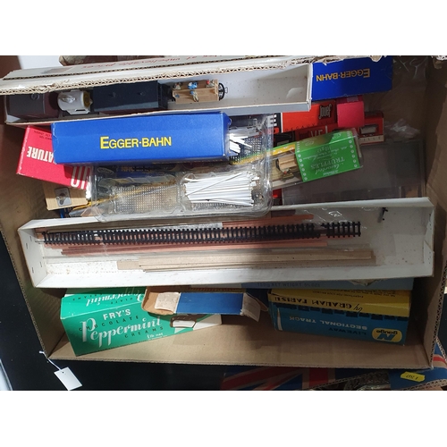 1313 - Two boxes of mainly boxed Jouef Egger-Bahn H0e Coaches and Wagons and various H0e and N gauge Track