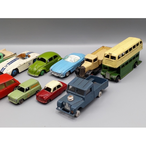 1325 - A box of unboxed play worn diecast including Dinky Toys No.169 Studebaker Golden Hawk, No.133 Cunnin... 